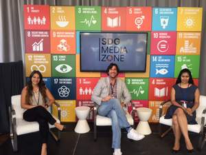 Matthew Bird with team 1-800-PublicRelations team members Dianna Guisti and Sravya Cherla at UN SDG Media Zone