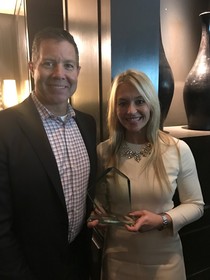 Jim Drill, president of MOVE Guides, and Brynne Herbert, company founder and CEO, receive a 2016 Aragon Research Innovator Award.