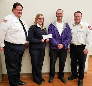 Attending the DVW grant presentation to the New Lenox Fire Protection District in New Lenox, Ill., are from left, Fire Marshal James Brown, Public Education Coordinator Marisa Schrieber, Joe Enzenberger of Dryer Vent Wizard of Will County and Deputy Chief Adam Riegel.