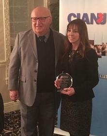 Andrew Silverstein, Chairman of the CIANJ Board and Rosanne Schwab, AVP, Public Relations Manager, accepting the award for Peapack-Gladstone Bank.