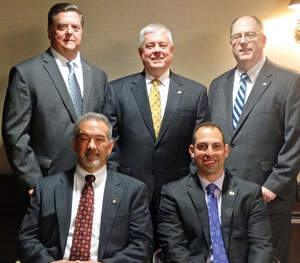 Peapack Capital Team – (seated left) Robert Cobleigh, Denny Smith (not pictured), (standing left to right) Frank Striplin, Christopher McManus, Mark Robinson and (seated right) Dennis Magarro