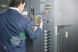 In order to ensure easy service ordering, a user uses the QR code scanner app on his smartphone or tablet to retrieve the machine's relevant information. The information is then automatically transmitted to the supplier, and the user is taken through a simple guided chat to determine whether an onsite technician visit is necessary.